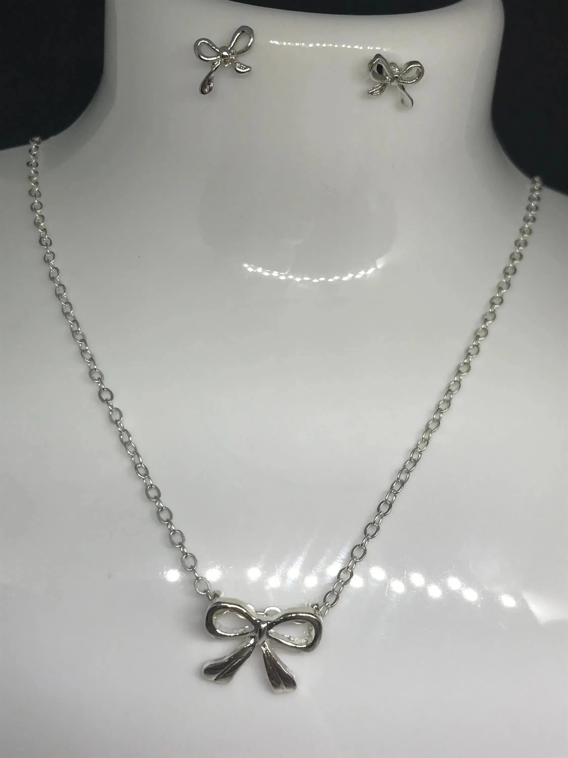 Silver Bowknot Pendant Necklace , Stainless Steel , Charm , Good Gift Choice , Elegant , Luxury time , Rust free shine and Earrings Set.