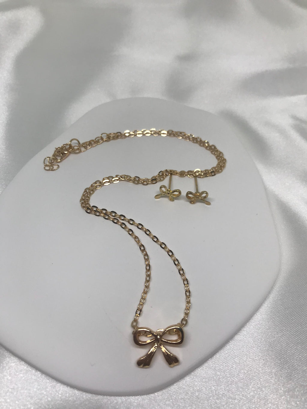 Bow Stainless Steal Hypoallergenic Necklace and Earrings.