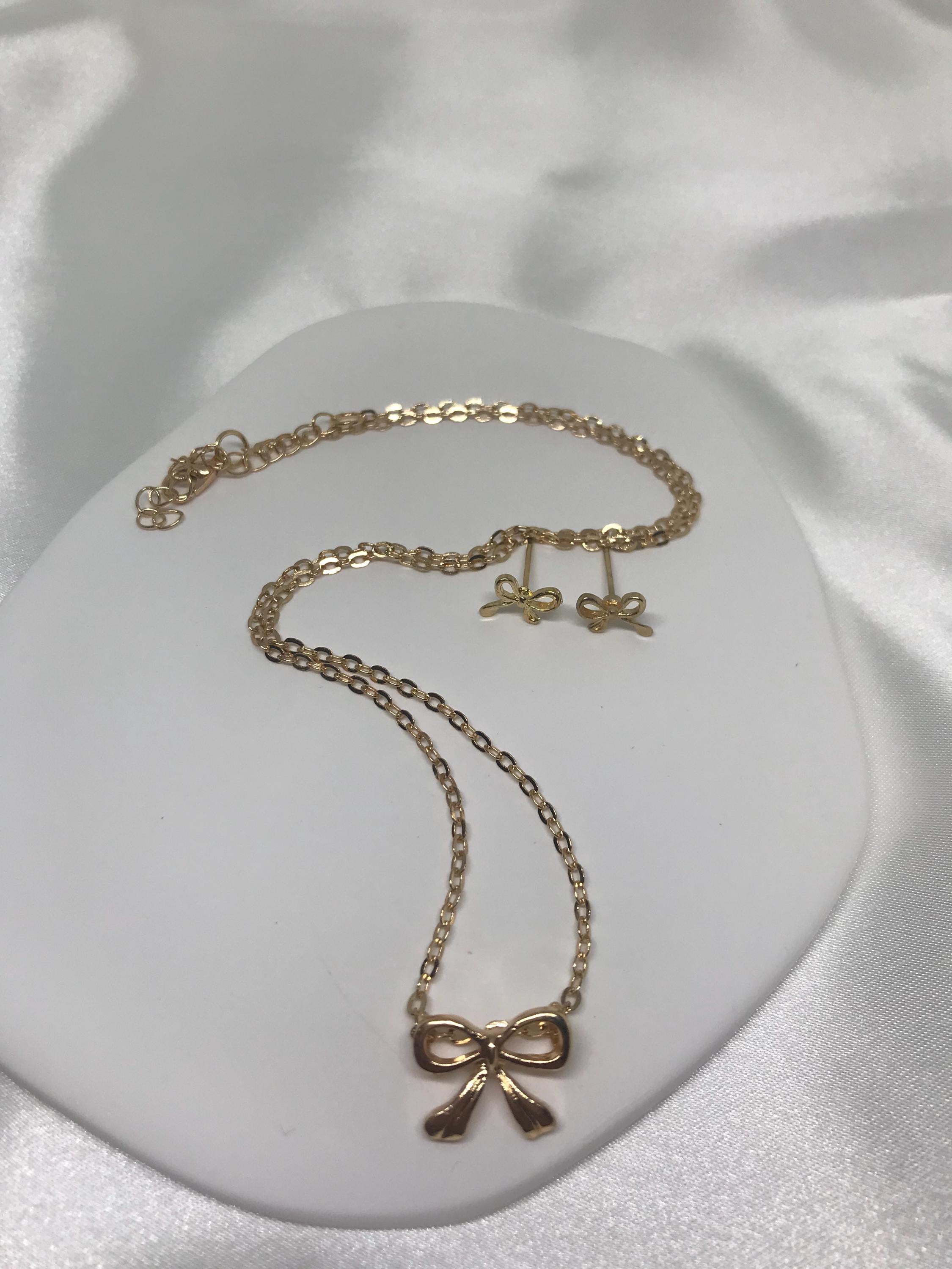 Bow Stainless Steal Hypoallergenic Necklace and Earrings.