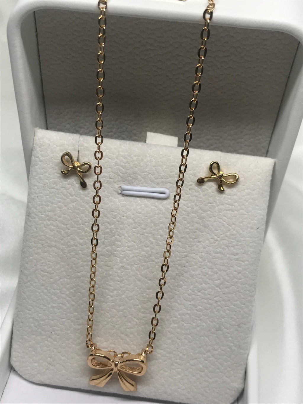 Bow Stainless Steal Hypoallergenic Necklace and Earrings.