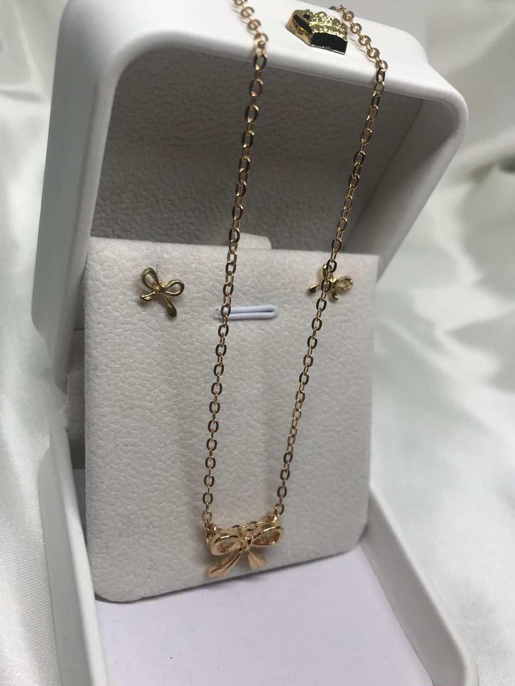 Bow Stainless Steal Hypoallergenic Necklace and Earrings.